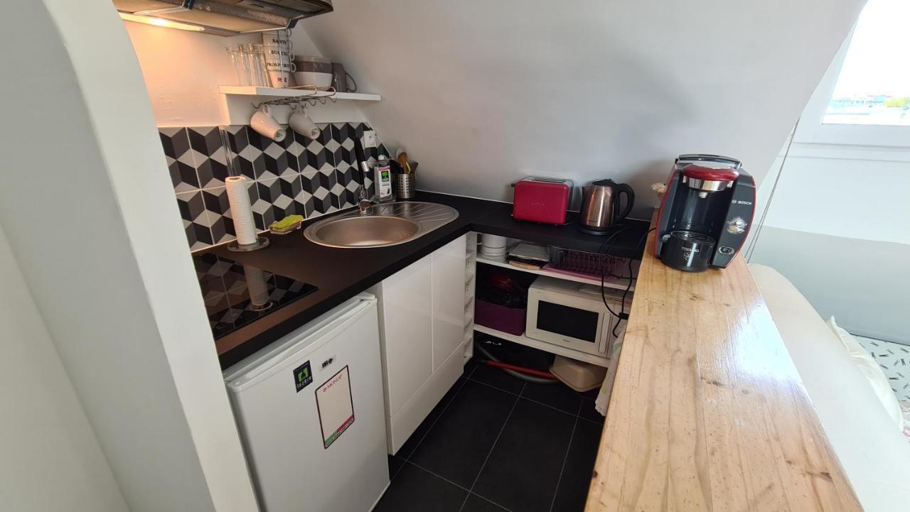 Appartement Coeur De Paris Avec Vue Sur Les Toits Exterior foto